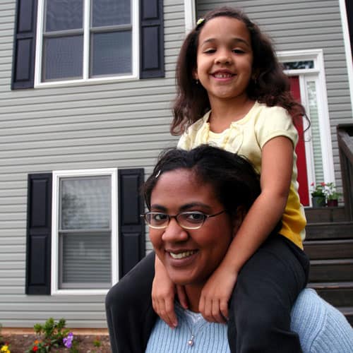 Child On Mother's Shoulders