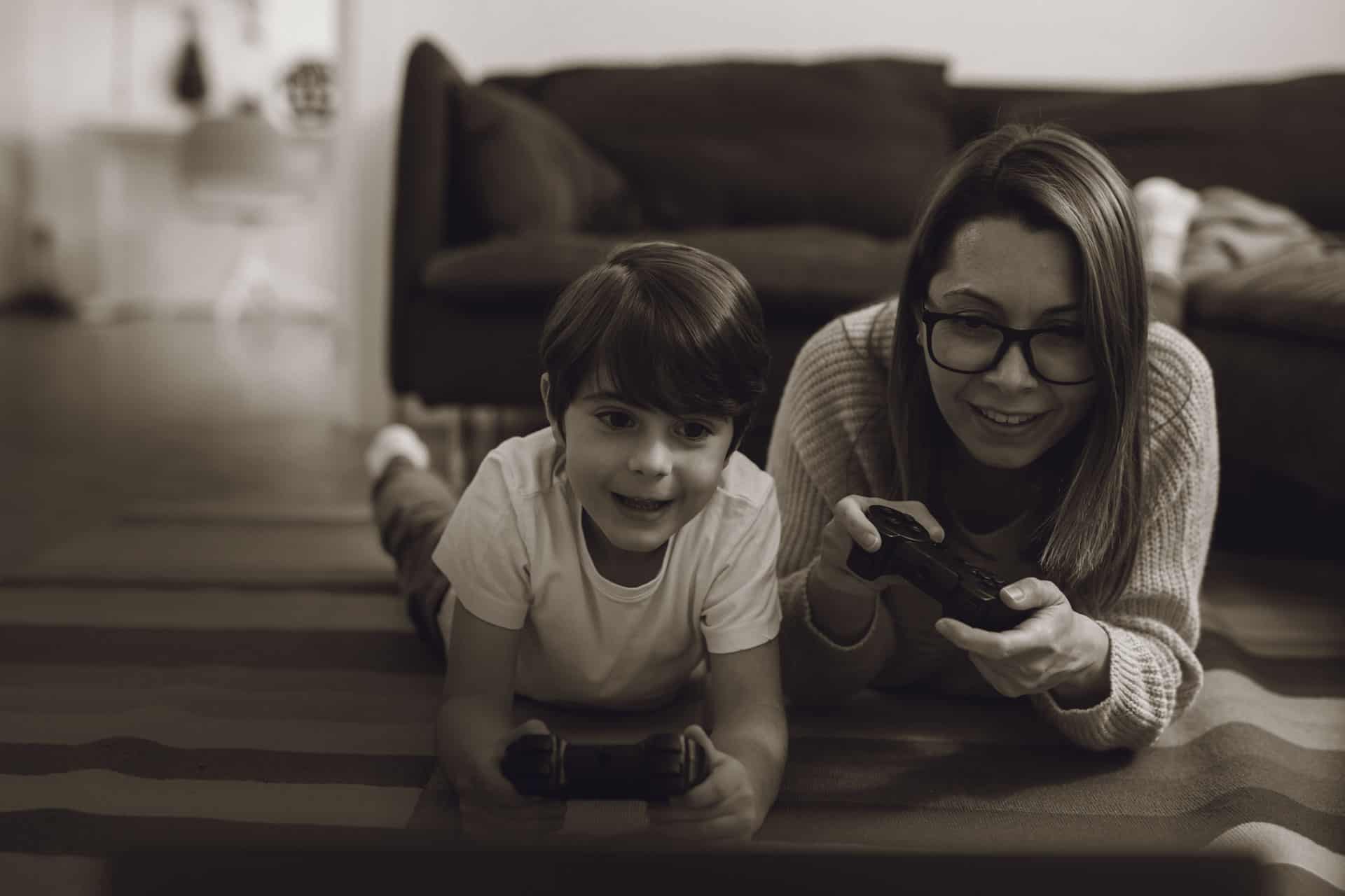 Mom and Son play video games at home